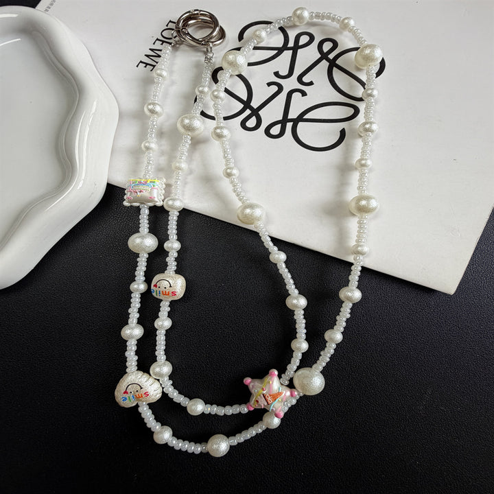 Dekorativer Perl Charm Brillen Kette Karnz
