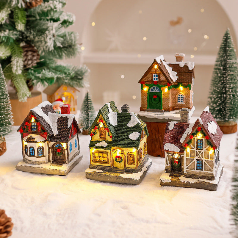 Dekoratives Weihnachtsdorf mit Lichtern Karnz