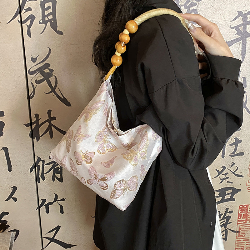Elegante Schmetterlingsdruck-Handtasche