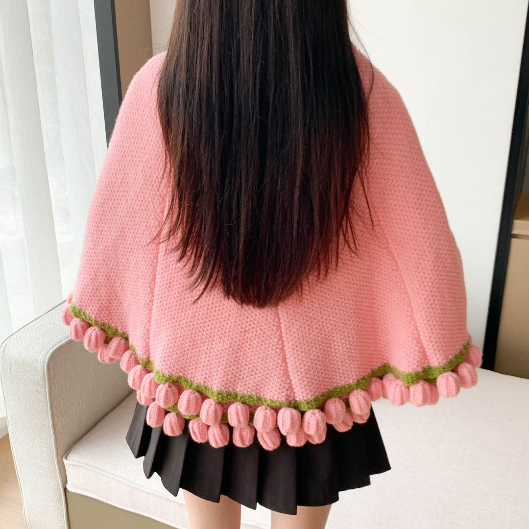 Gemütlicher gestrickter Deckenumhang