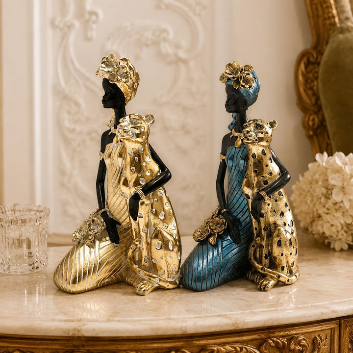 Elegante Skulptur mit Leoparden Karnz
