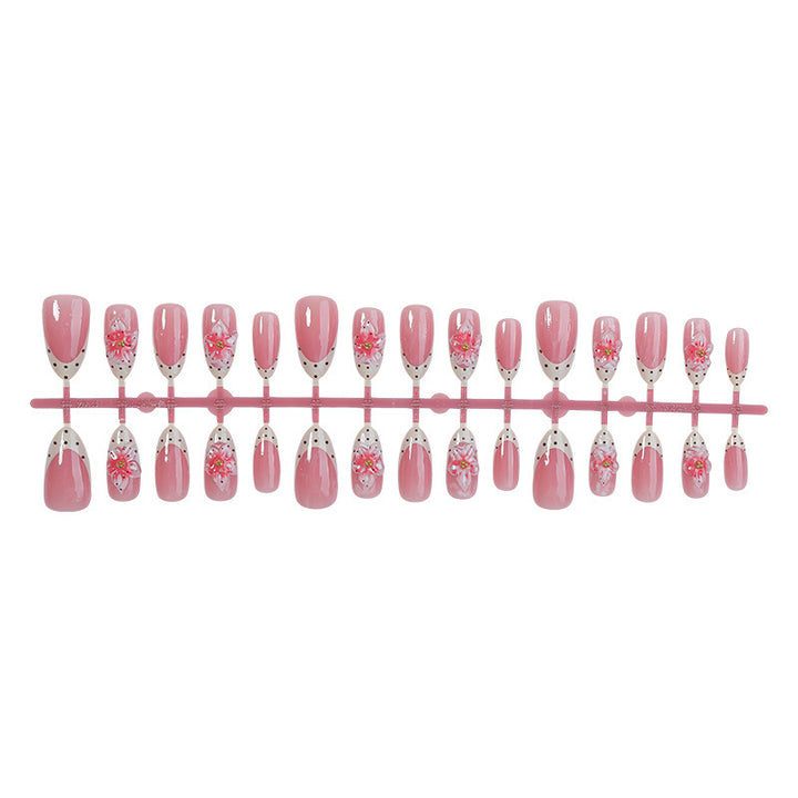 Kunstnagel-Set mit floralen Designs und Glitzerakzenten Karnz