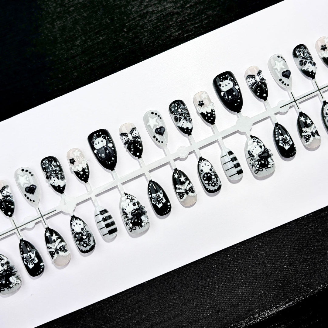 Künstlerisches Press-On Nagelkunstset mit kreativen Designs