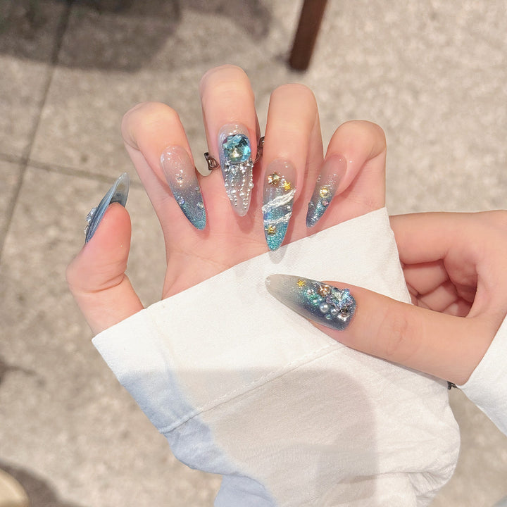 Elegante Stiletto Press-On Nagelset mit Glitzerakzenten