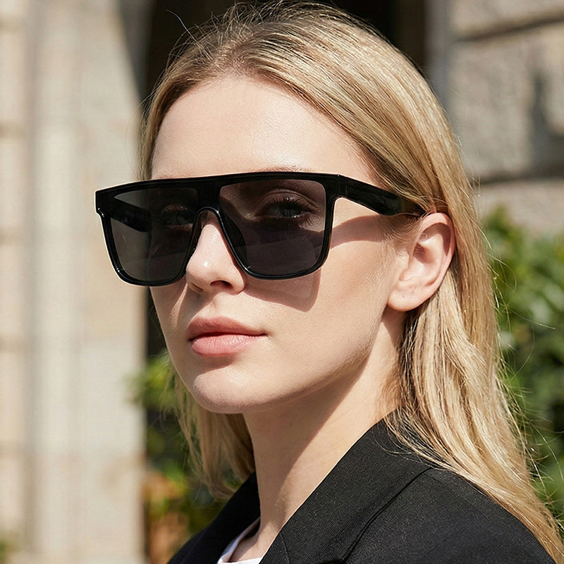 Damen Sportliche Sonnenbrille mit breitem Rahmen und polarisierenden Gläsern Karnz
