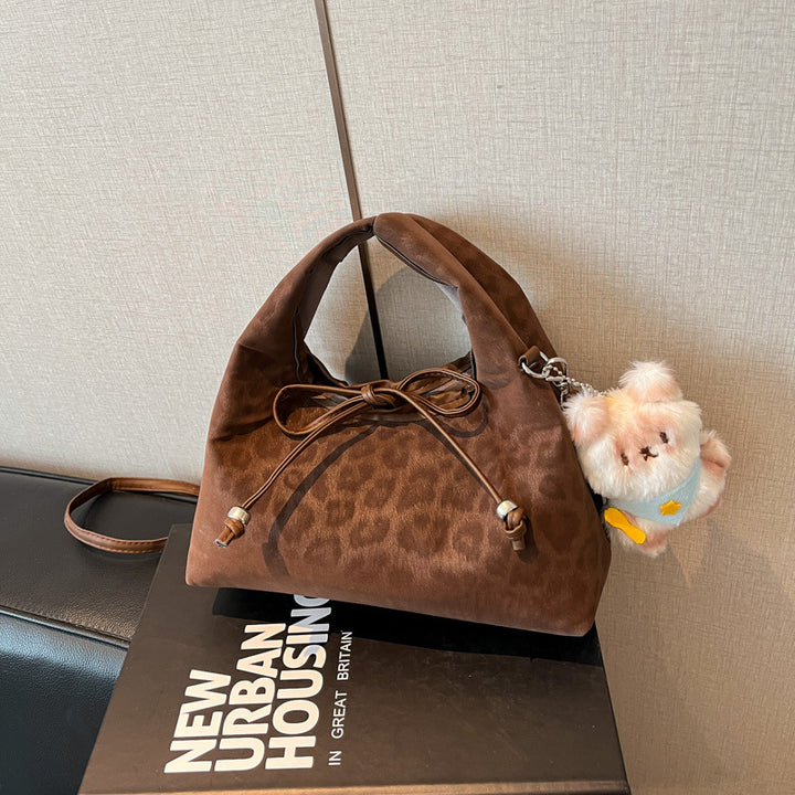 Stylische und funktionale Drawstring-Handtasche Karnz
