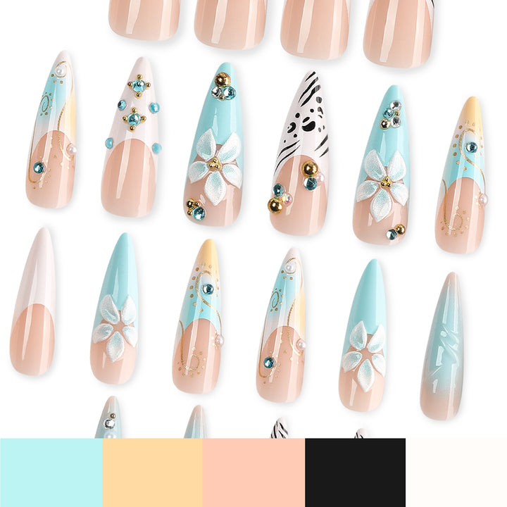 Kunstvolle Stiletto-Nägel mit floralen Akzenten und Glitzerdetails Karnz