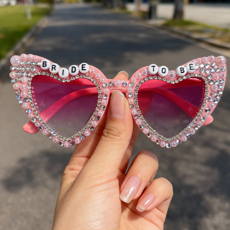 Herzförmige mit Perlen verzierte Sonnenbrille Karnz