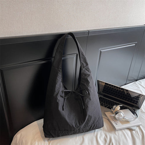 Lässiger verstellbarer Sling Tote