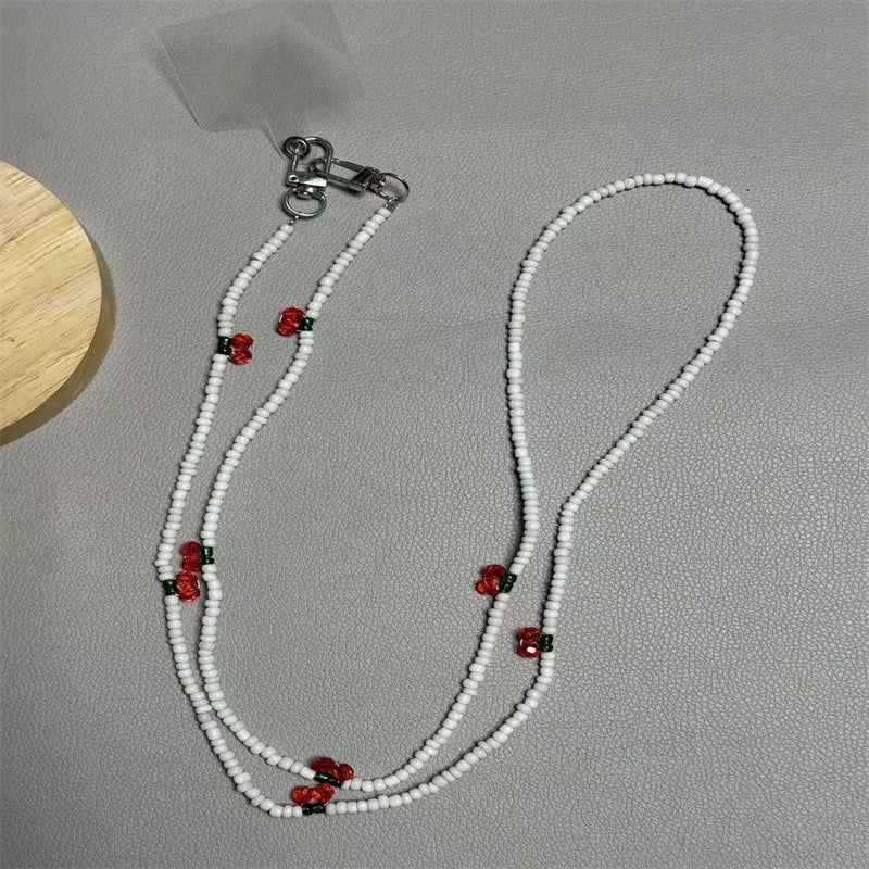 Perlen-Brillenband mit künstlerischen Charms Karnz
