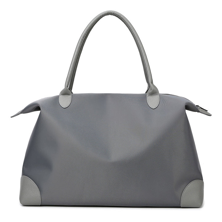 Wasserfester erweiterbarer Reisehandtasche