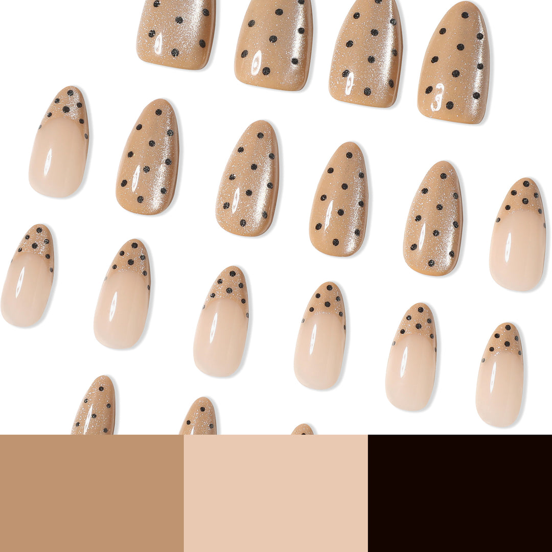 Elegante Stiletto-Nägel mit Glitzer- und Punktedesign Karnz