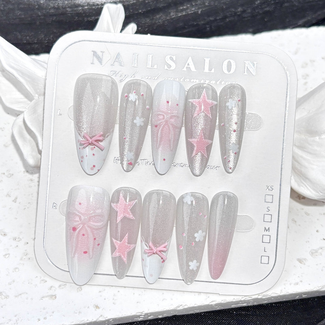 Dekorative Press-On Nagelkunst Set mit Sternen und Schleifen