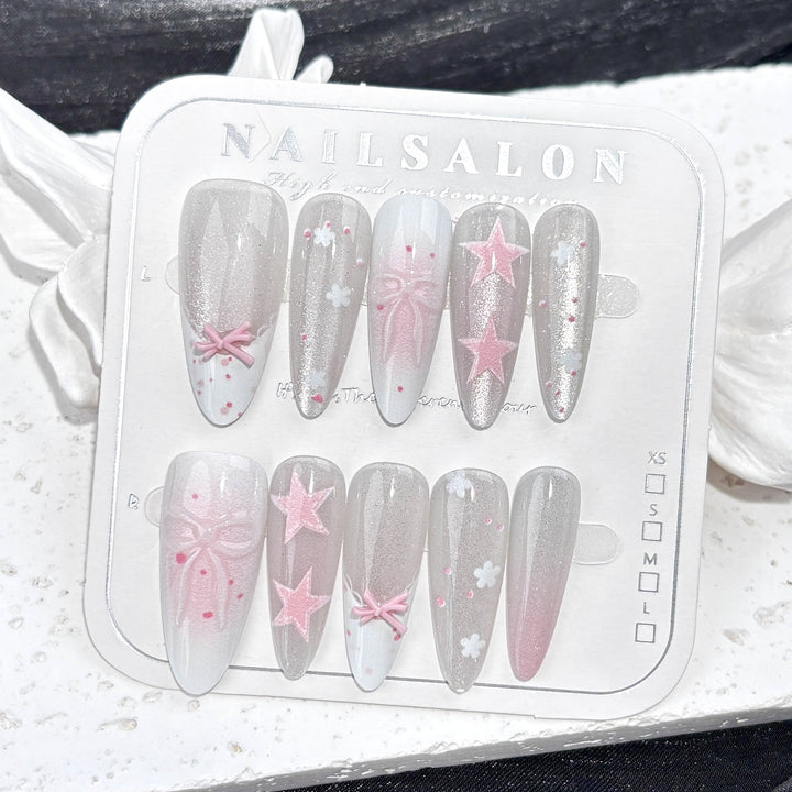 Dekorative Press-On Nagelkunst Set mit Sternen und Schleifen