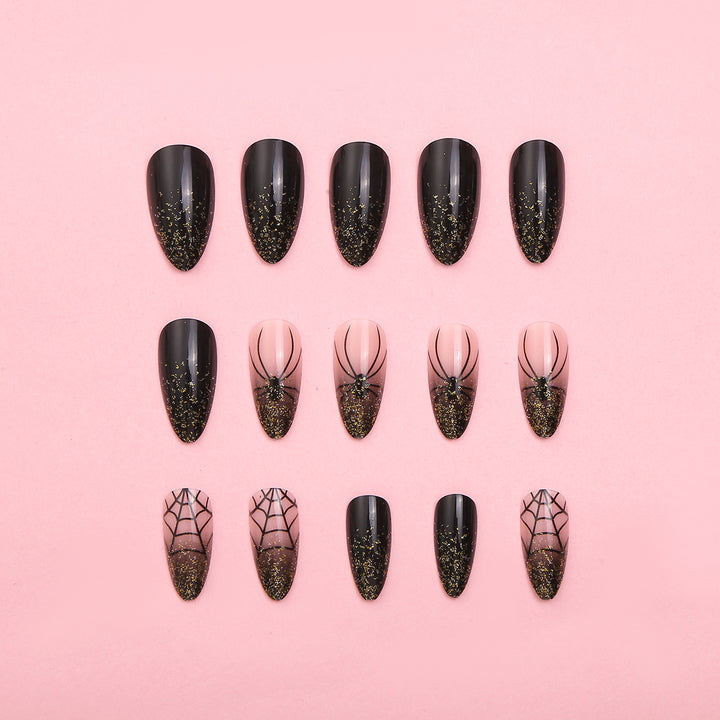Künstlerisches Press-On Nagelset mit Glitzer und Spinnennetzdesign Karnz