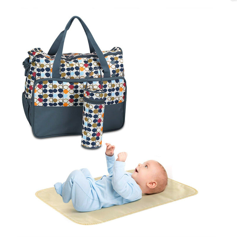Multifunktionale Wickeltasche mit Wickelmatte Karnz