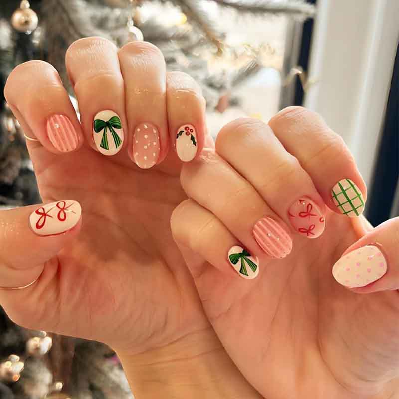 Kunstnagelset mit festlichen Schleifen- und Weihnachtsmotiven Karnz