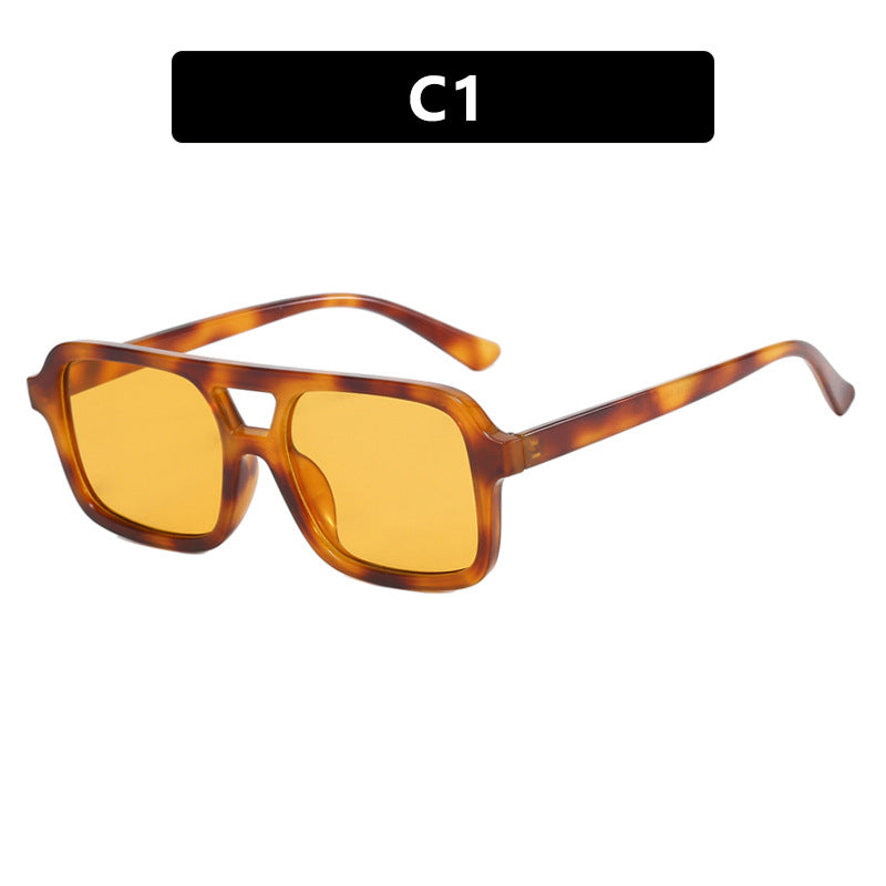 Damen moderne quadratische Sonnenbrille mit schützendem UV-Filter und transparentem Rahmen Karnz