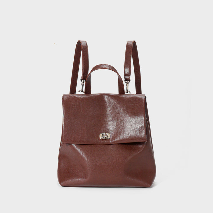 Umwandelbare Leder Klappen-Rucksack-Handtasche mit Obergriff und Drehverschluss