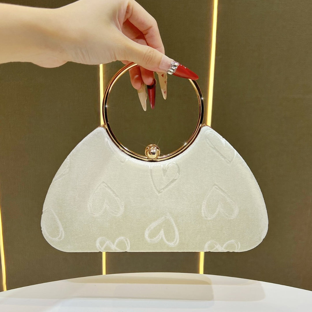 Herz-verzierte Handtasche