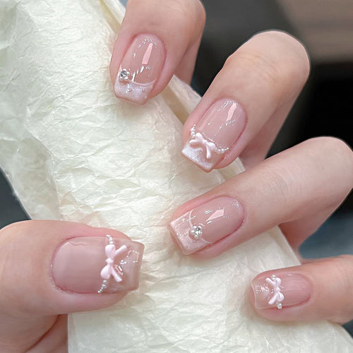 Elegante französische Spitze Aufkleber-Nagelkunst mit Schleifenakzenten Karnz