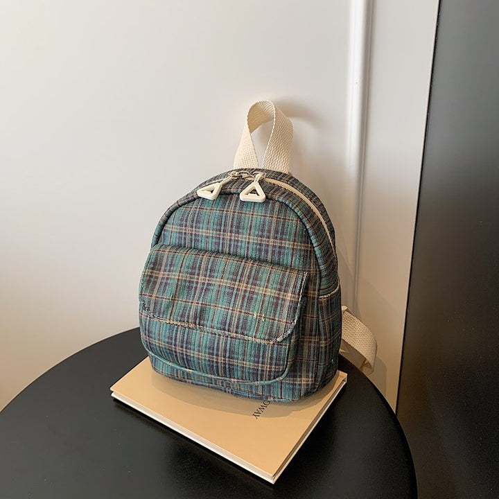 Kompakter gestreifter Mini-Rucksack