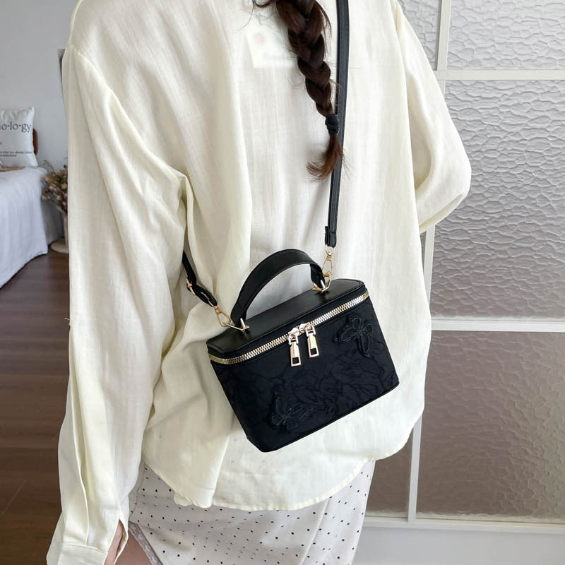 Elegante floral bestickte Handtasche