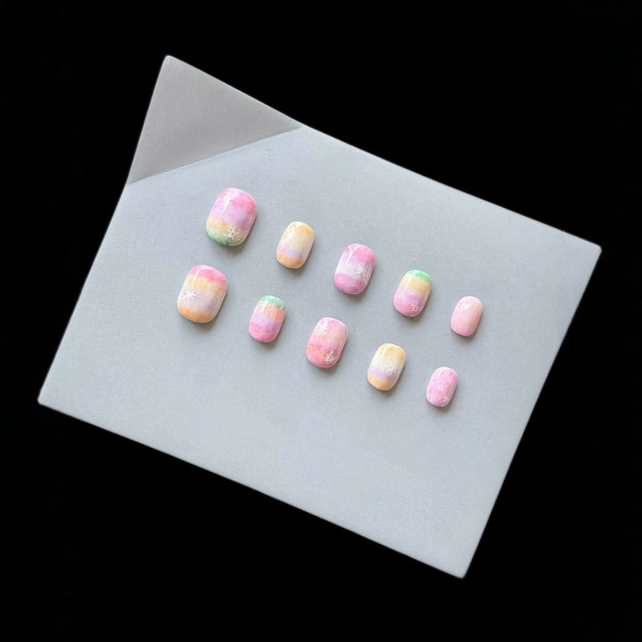 Künstlerisches Press-On Nagelset mit Ombre- und Sternendesign