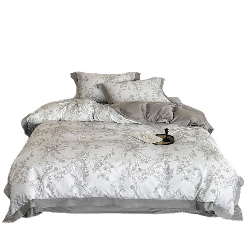 Exklusive Baumwollsatin-Bettwäschegarnitur mit floraler Jacquardstruktur und Wendefunktion