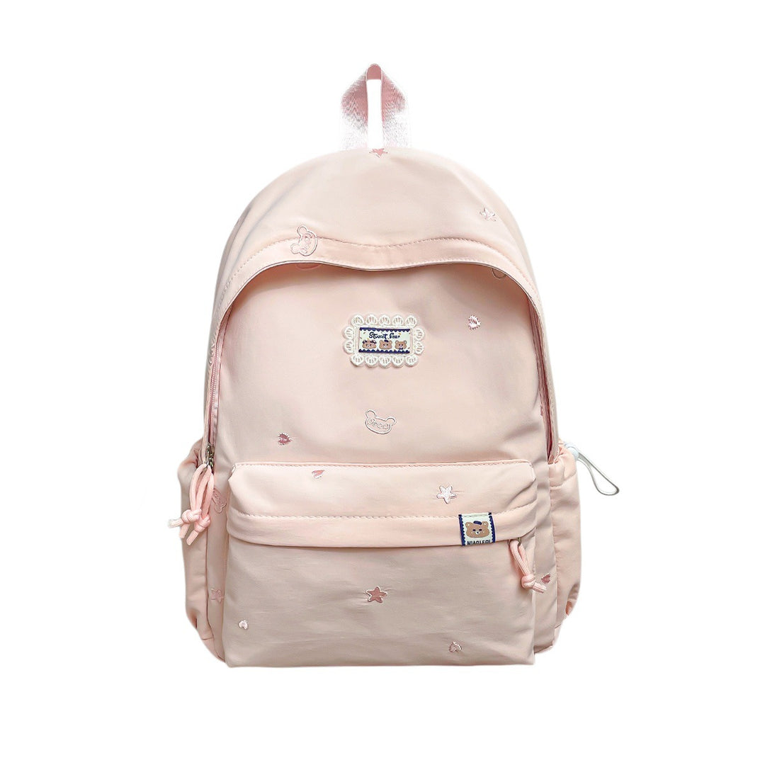 Stylischer backpack mit floralem Schmuck Karnz