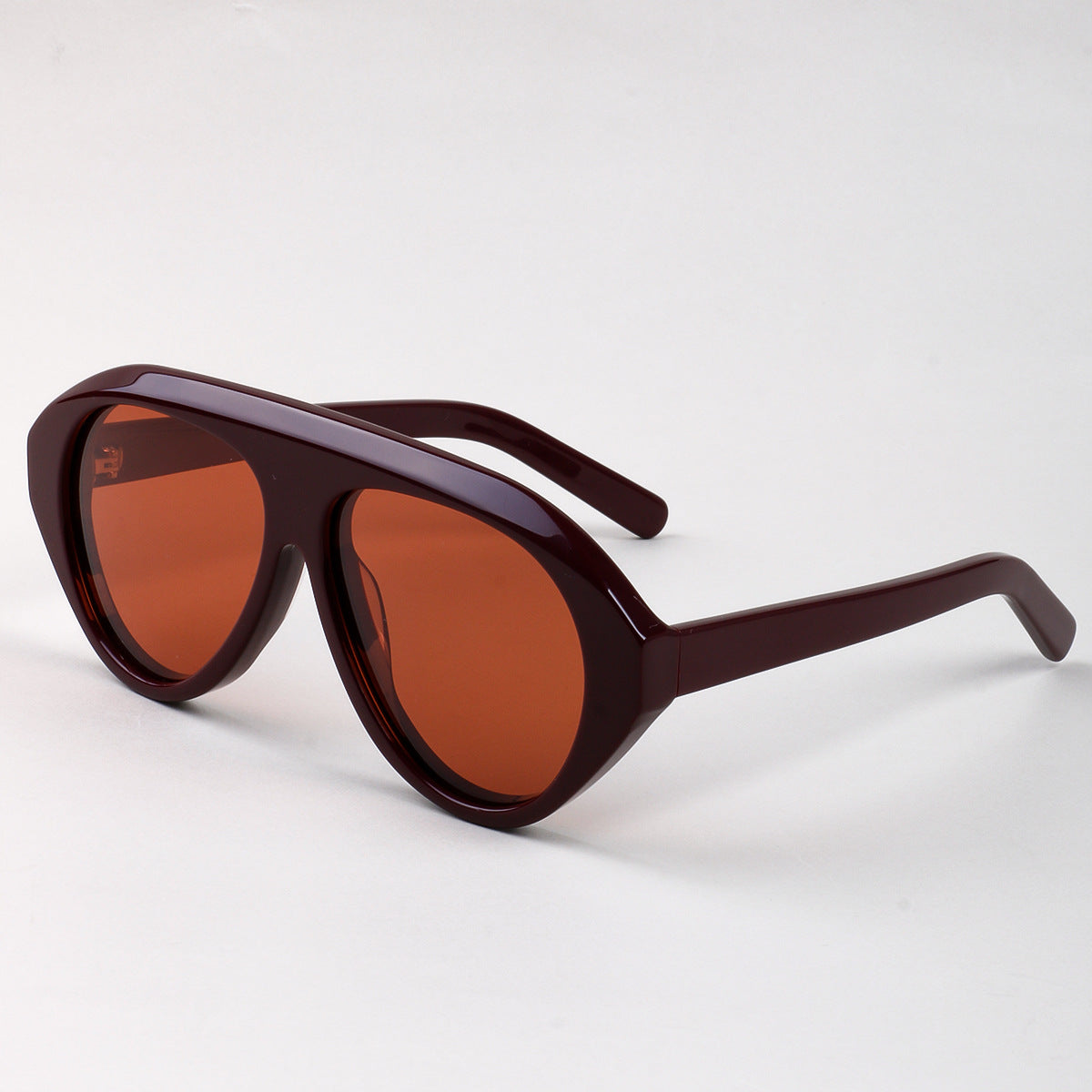 Damen Statement Sonnenbrille mit breitem Rahmen und grünen Gläsern Karnz