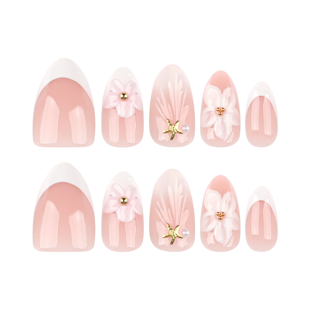 Elegante Kunstnägel mit floralem Design und Glitzerakzenten Karnz