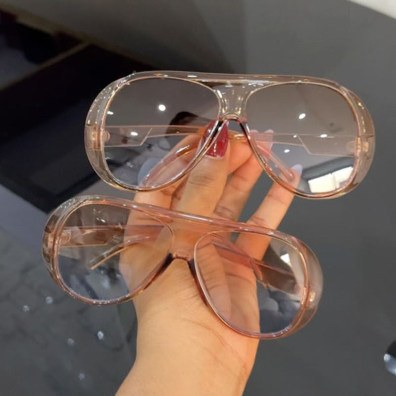 Damen sportliche Sonnenbrille im futuristischen Design Karnz