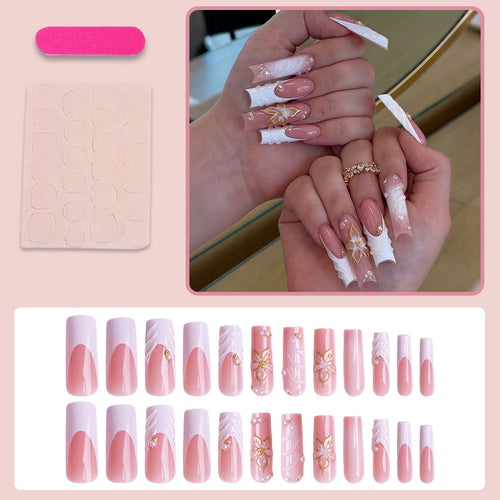 Kunstnagelset mit eleganten Blumendesigns Karnz