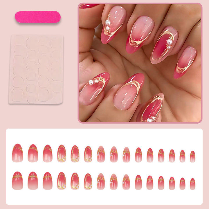 Kunstnagelset mit eleganten Ombré-Designs und Glitzerakzenten Karnz