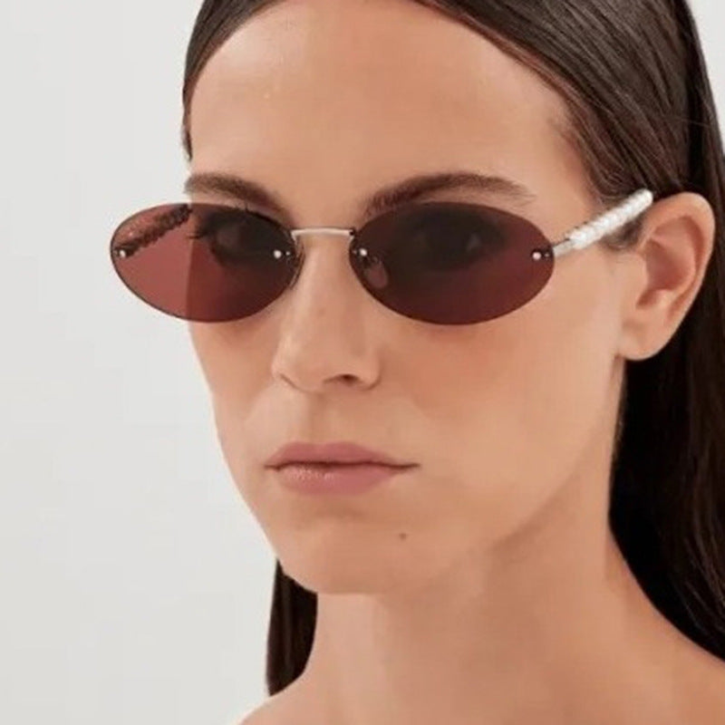 Damen stilvolle ovale Sonnenbrille mit eleganten Verzierungen Karnz