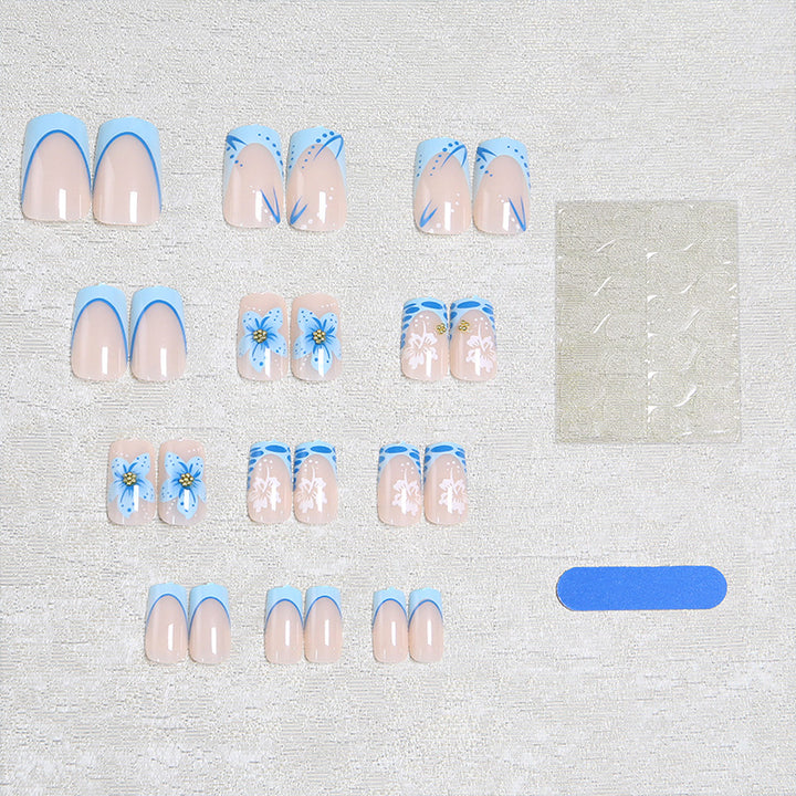Kunstnagelset mit exquisiten Blüten- und Glitzerakzenten Karnz
