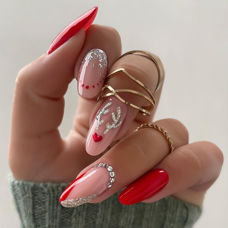 Künstlerisches Press-On Nagelset mit Herz- und Glitzerelementen Karnz