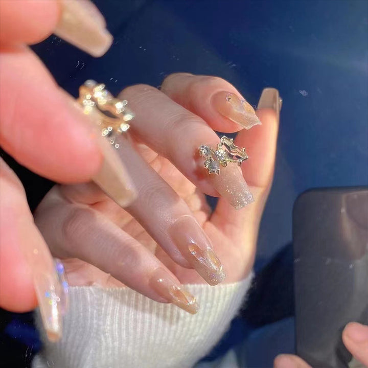 Kunstnagelset mit funkelnden 3D-Schmetterlingsverzierungen Karnz