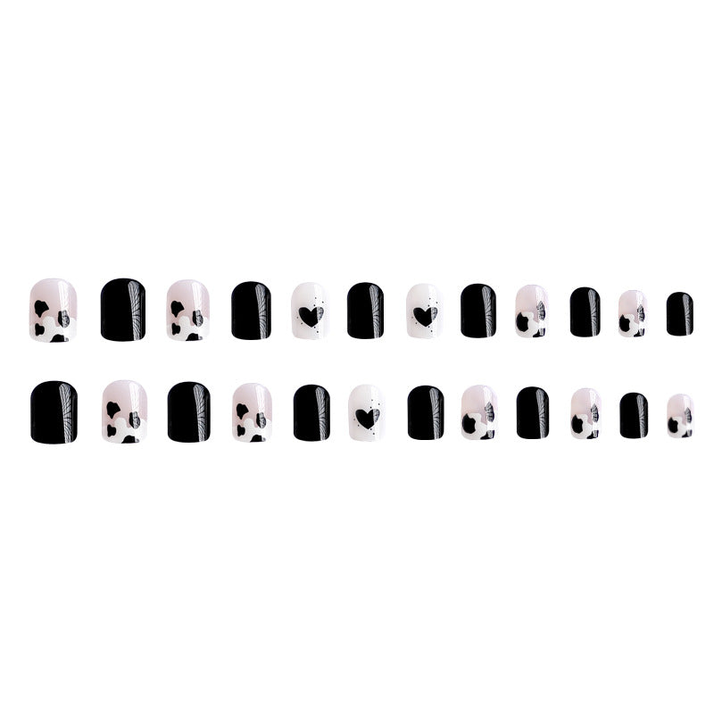 Kreative Nagelkunst mit Herz- und Tiermotiven Karnz