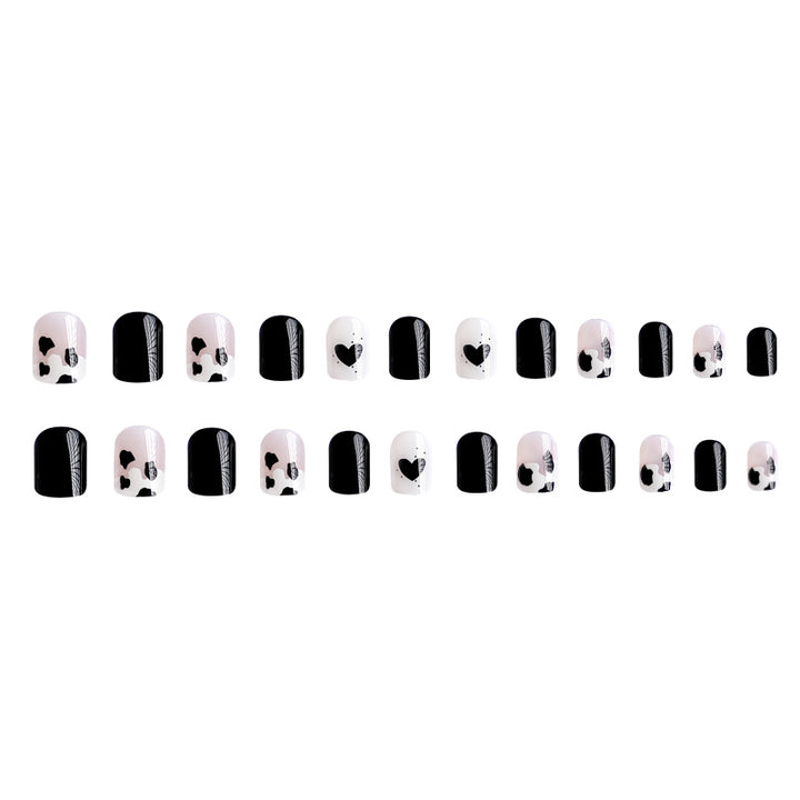 Kreative Nagelkunst mit Herz- und Tiermotiven Karnz