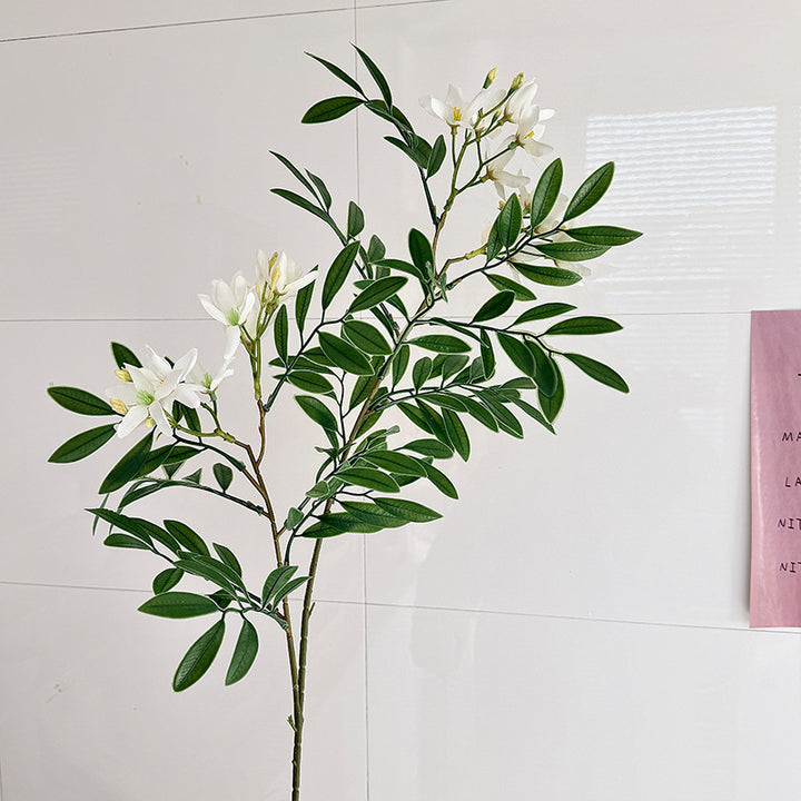 Dekorativer Kunstblütenzweig mit zarten Blüten Karnz