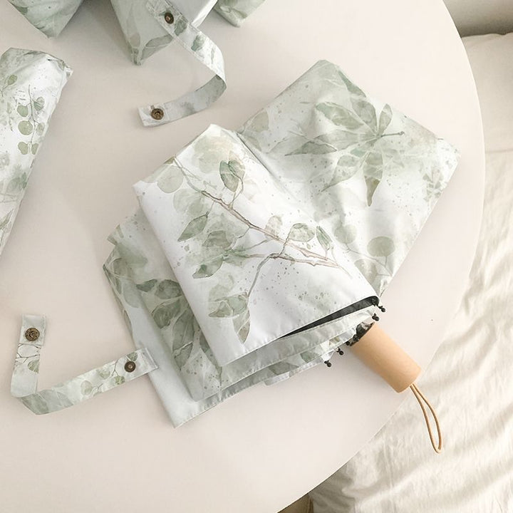Damen Faltregenschirm mit botanischem Druckdesign Karnz