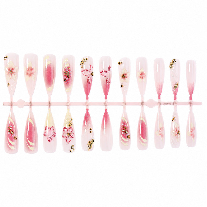 Dekorativer Stiletto Press-On Nagelkunst Set mit floralem Akzent Karnz
