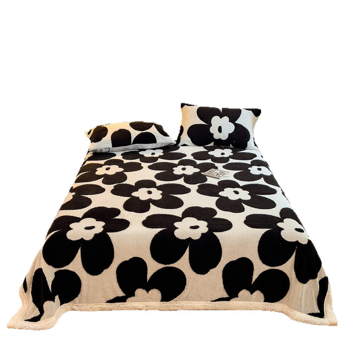 Gemütliche floral gemusterte Fleece-Decke