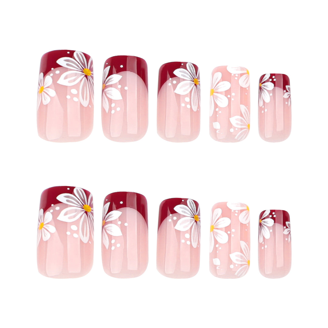 Kunstvolle Nagelverlängerungen mit Blumenmotiv Karnz