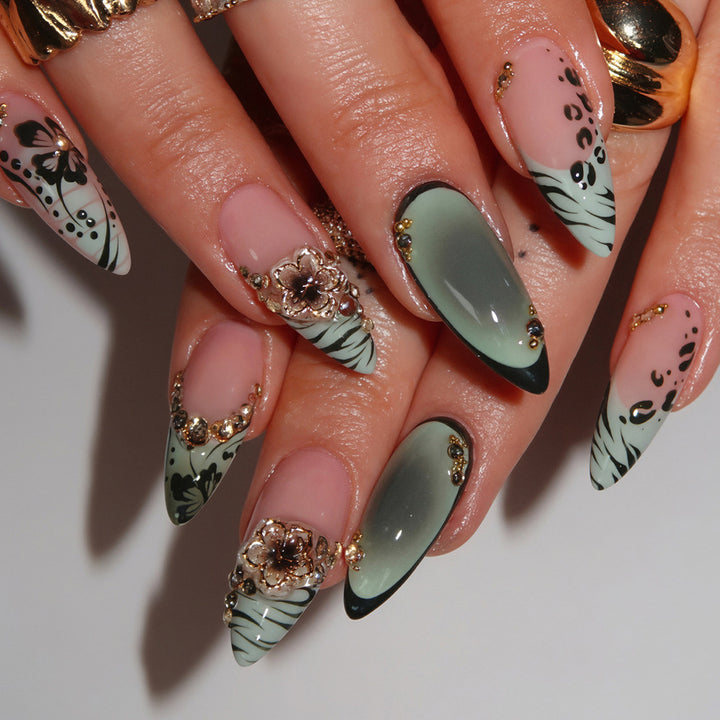 Dekorative Stiletto Nagelkunst Tipps mit floralen Akzenten Karnz