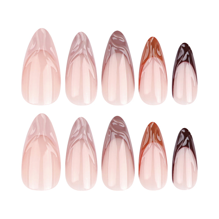 Kunstvolle Stiletto-Nägel mit elegantem Farbverlauf und Glitzerakzenten Karnz