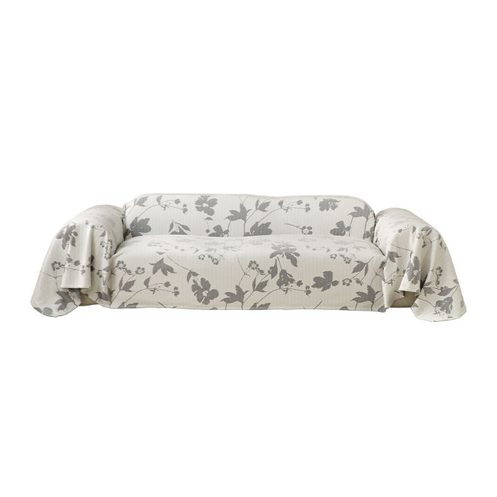 Elastischer Sofa‑Schonbezug mit floraler Reliefstruktur und universeller Passform