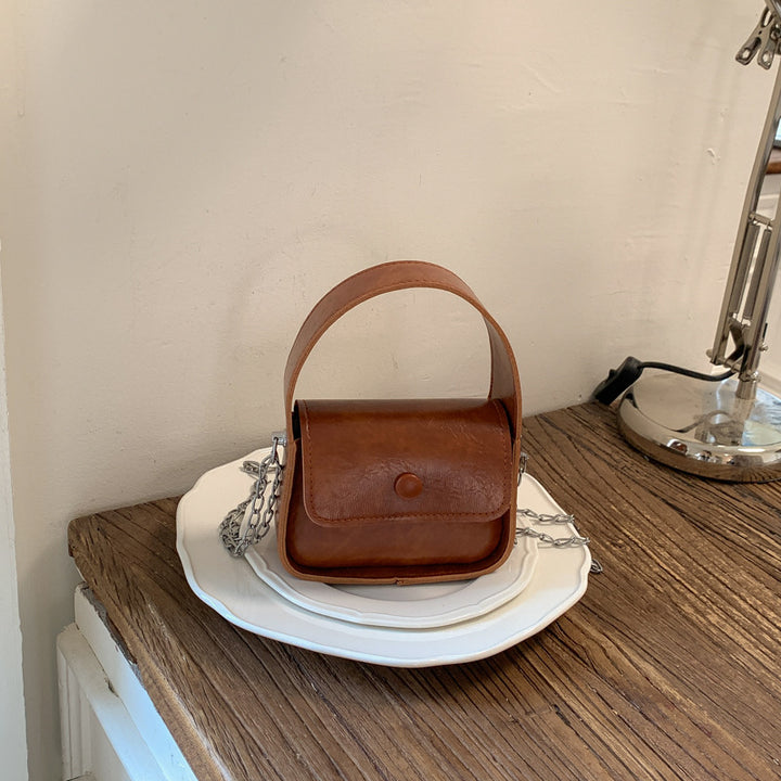 Vintage-inspirierte Lederhandtasche